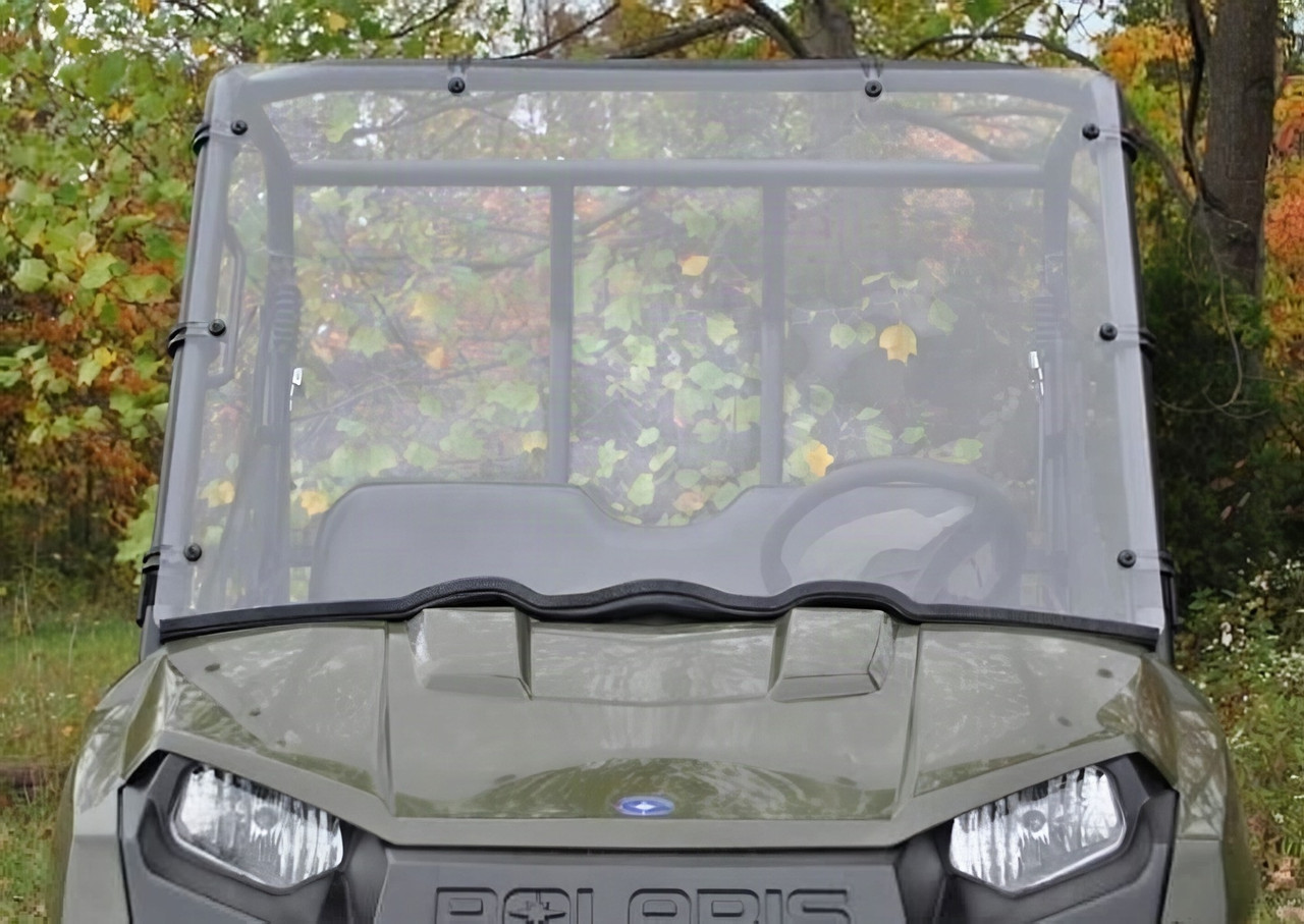 SuperATV scratch resistant full windshield on an olive green mid-size Polaris Ranger, straight front view in autumn woods