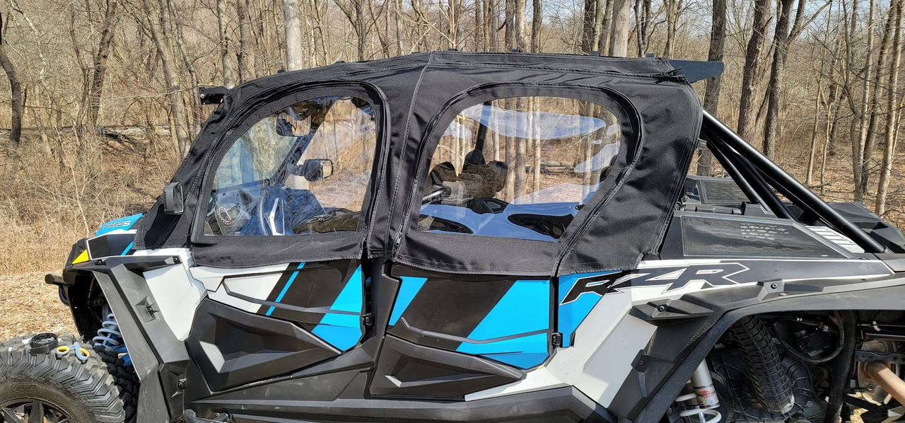 Side X Side upper doors kit with clear windows on a blue and white Polaris RZR S4, driver side view in the woods