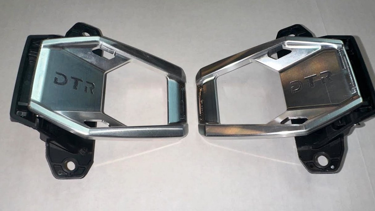 Dirty Teeth Racing billet aluminum interior door handles for Polaris Xpedition, pair laid on white with DTR engraving