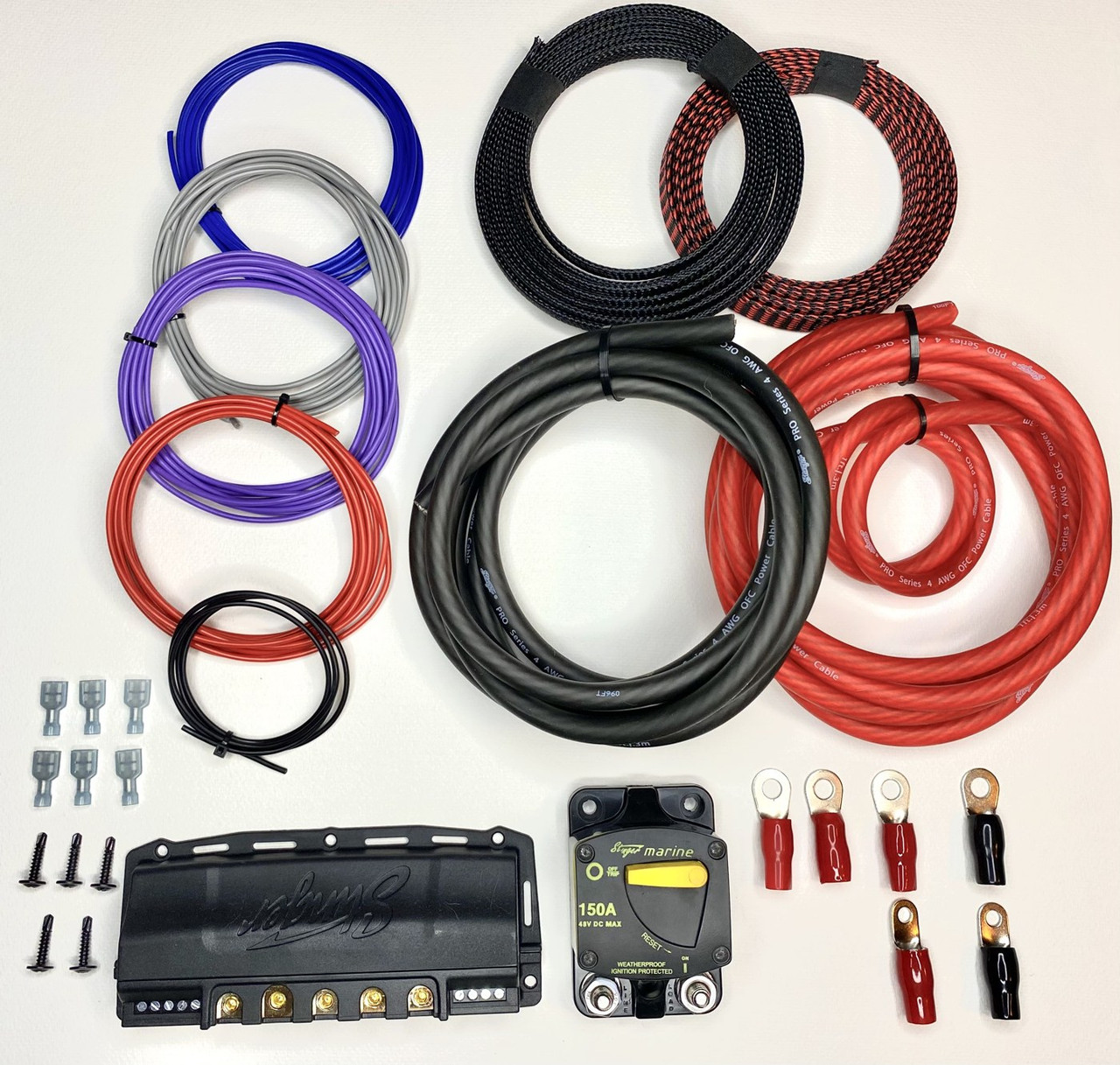 Full Dirty Teeth Racing 150 amp busbar power kit laid out: cables, loom, breaker, relay busbar, lugs and hardware