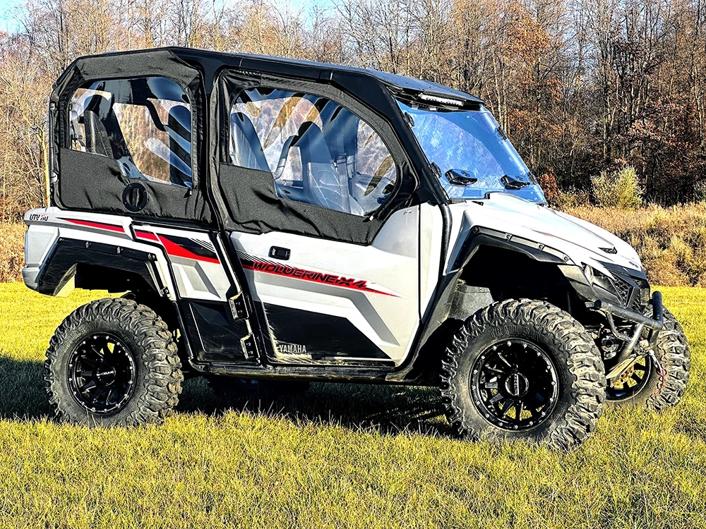 Spike door kit for Yamaha Wolverine X4 4-seat: door kit on a white four-seat UTV, side view in a field