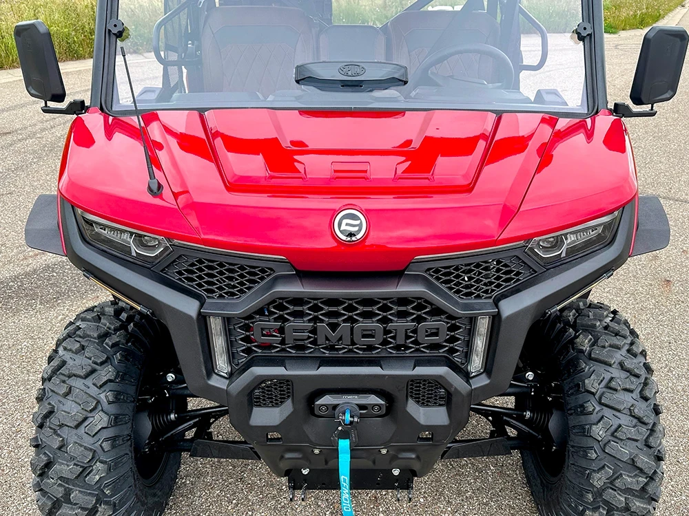 Spike fender flares for CF Moto UForce U10 Pro and U10 Pro XL: fender flares on a red CFMOTO UTV, front view
