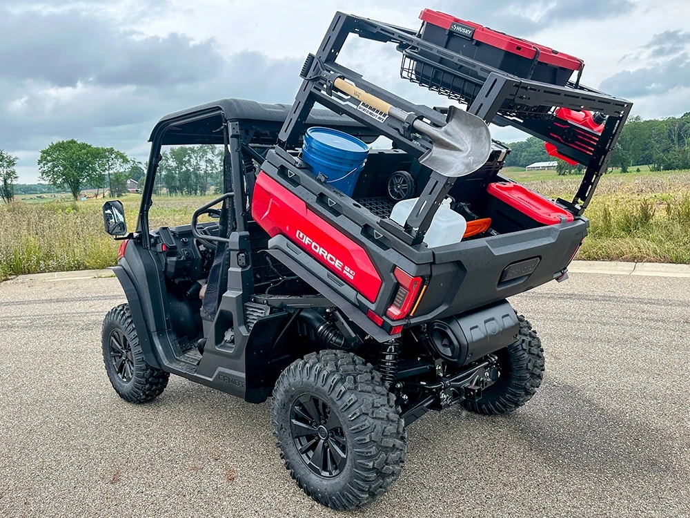 Spike fender flares for CF Moto UForce U10 Pro and U10 Pro XL: red UTV with a loaded bed rack, rear corner view
