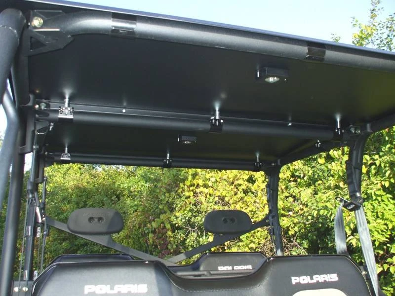 Underside of the Extreme Metal Products hard top on a Polaris Ranger 800 Crew showing the dome light and clamps