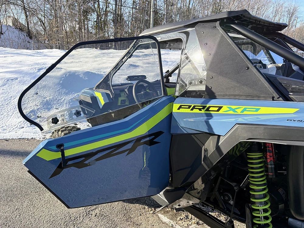 SCM door kit for Polaris RZR Pro XP and Pro S 2-seat: open upper door on a grey Polaris RZR Pro XP