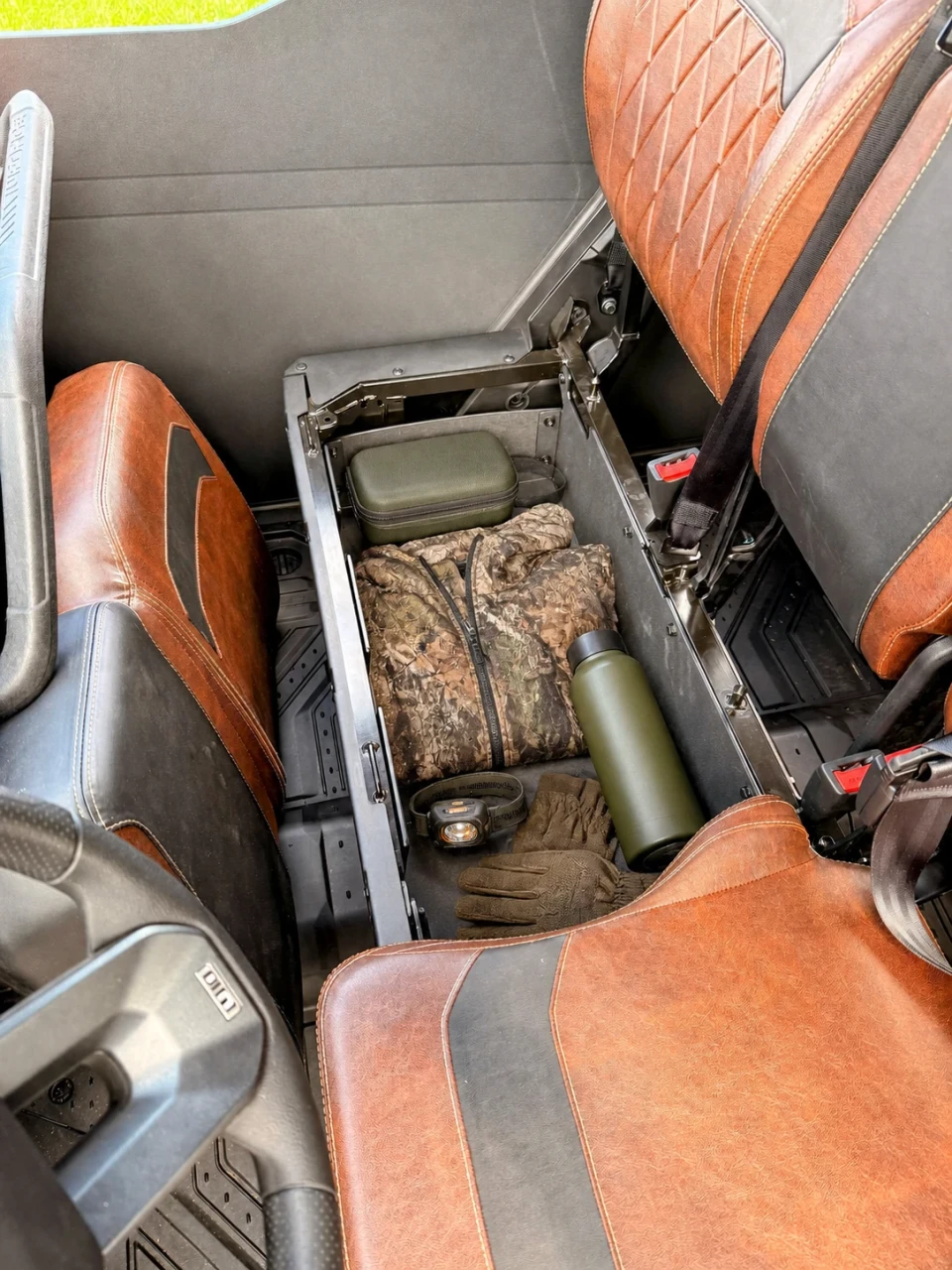SCM gear box for CF Moto UForce U10 Pro XL: under-seat gear box holding a jacket and bottle