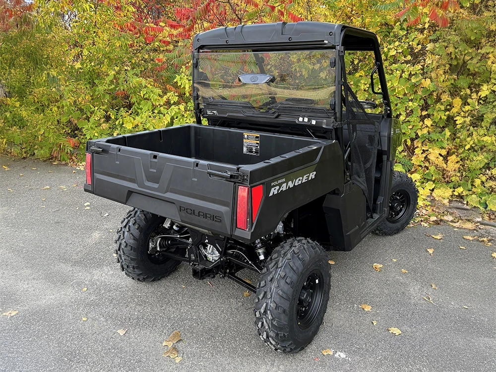 Spike rear windshield for Polaris Ranger 500: rear windshield on a black Polaris Ranger, rear corner view