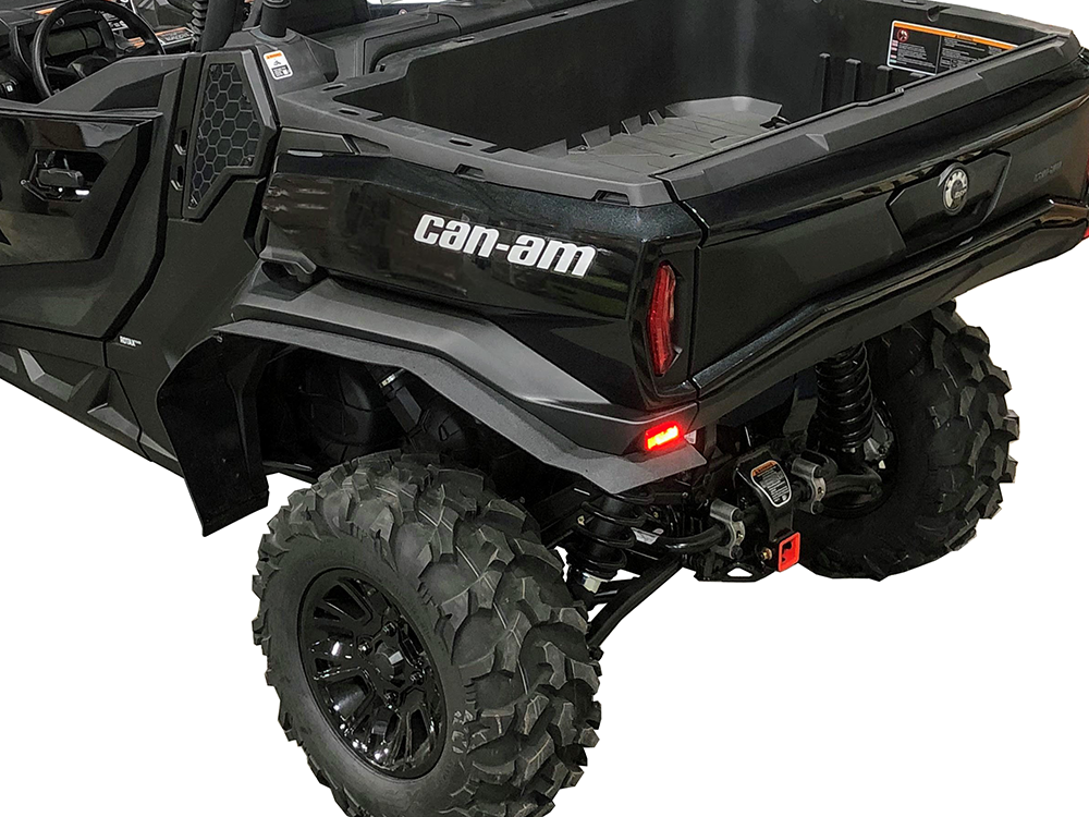Spike fender flares for Can-Am Commander and Commander MAX: rear fender flare on a black Can-Am, close-up