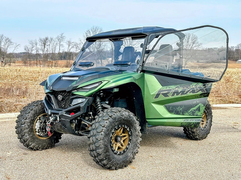 SCM door kit for Yamaha Wolverine RMAX2 1000 and X2 850: open upper door on a green Yamaha RMAX, front corner