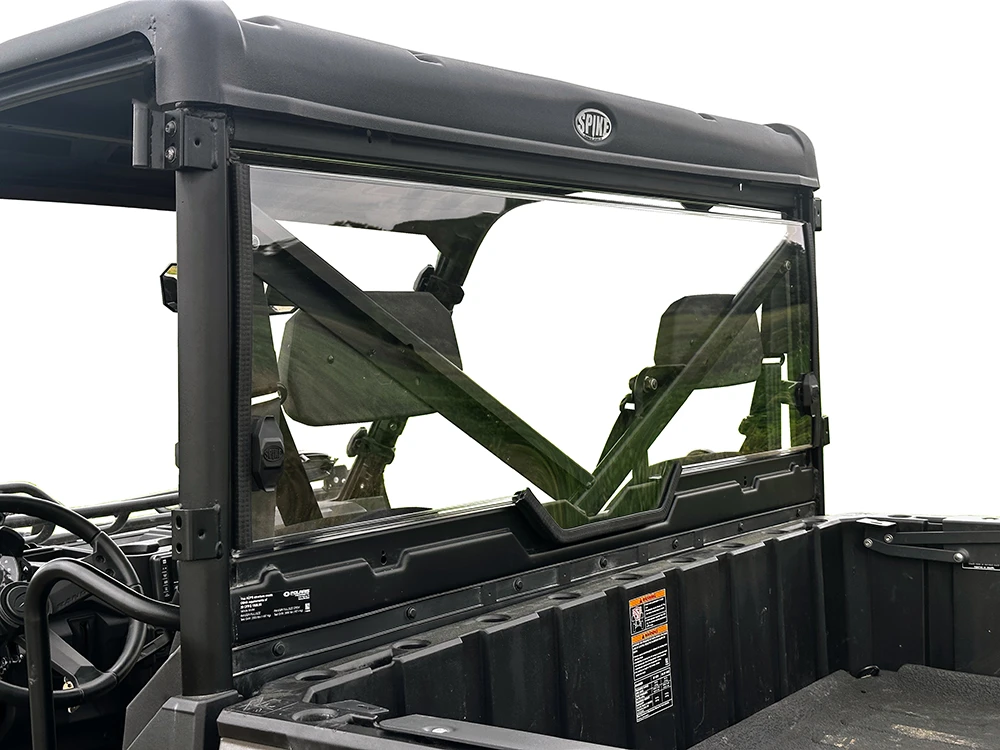 Spike rear windshield for Polaris Ranger XP 1000: tinted rear windshield behind the cab, view over the bed