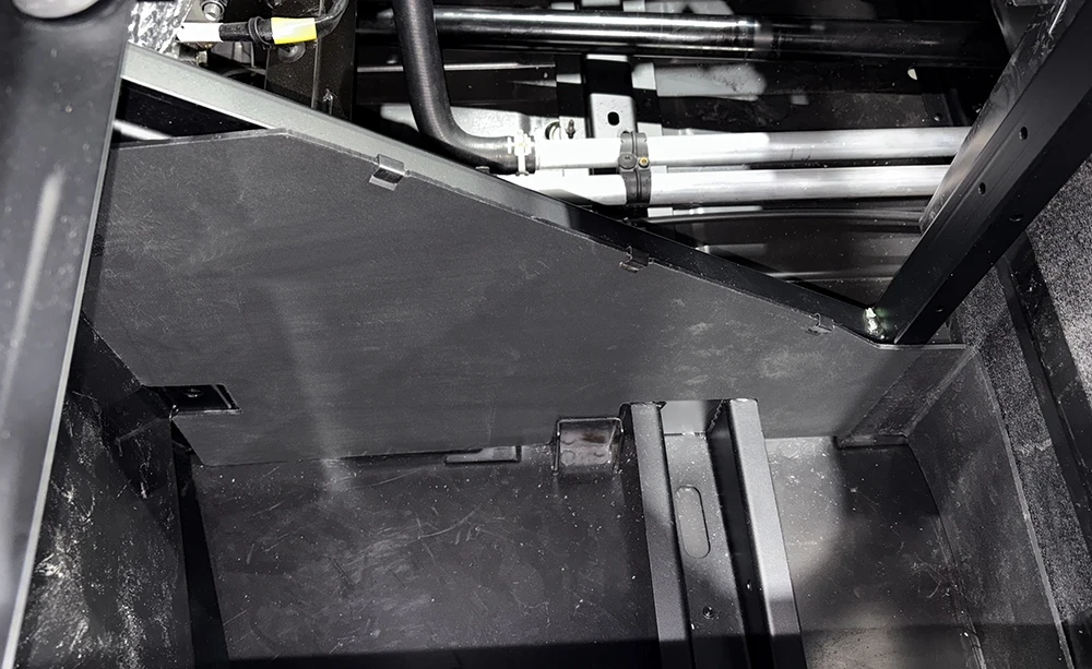 SCM block-off and splash panels for Polaris Ranger 500: block-off panel installed in the under-seat area