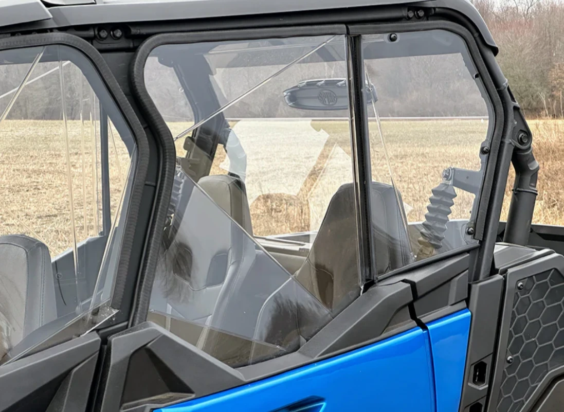 SCM door kit for Can-Am Commander MAX: clear upper doors on a blue UTV, side close-up outdoors