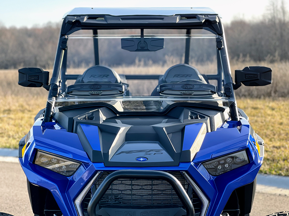 Spike windshield for Polaris RZR XP 1000: vented windshield on a blue Polaris RZR, straight front view