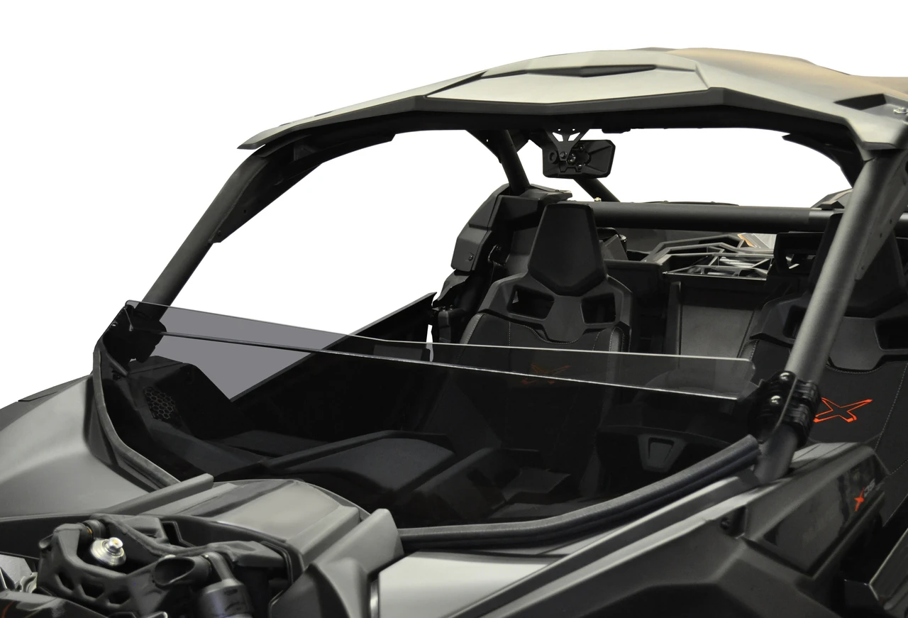 Spike short windshield for Can-Am Maverick X3 and X3 MAX: tinted short windshield on a black UTV, front corner view on white