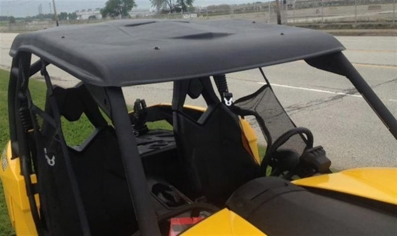 Extreme Metal Products black plastic top installed on a yellow Can-Am Maverick, close side view over the cab