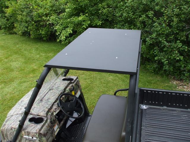 Extreme Metal Products steel top over the bench seat and cargo bed of the Kawasaki Mule, viewed from above the side