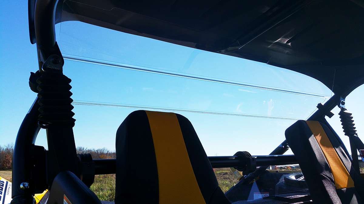 Spike Powersports rear window seen from inside the Yamaha YXZ cab above the seats and roll cage