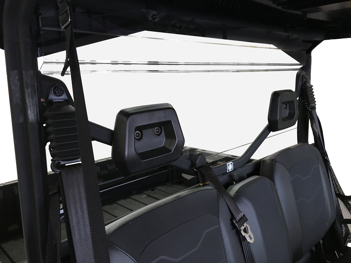 View from inside the Can-Am Defender cab looking back at the Spike Powersports tinted rear windshield and vent