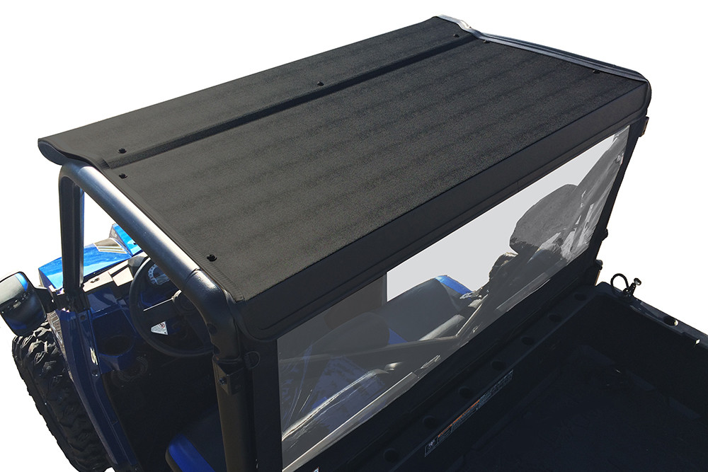 Rear three-quarter view of the Spike Powersports hard roof on the blue Polaris Ranger with rear window