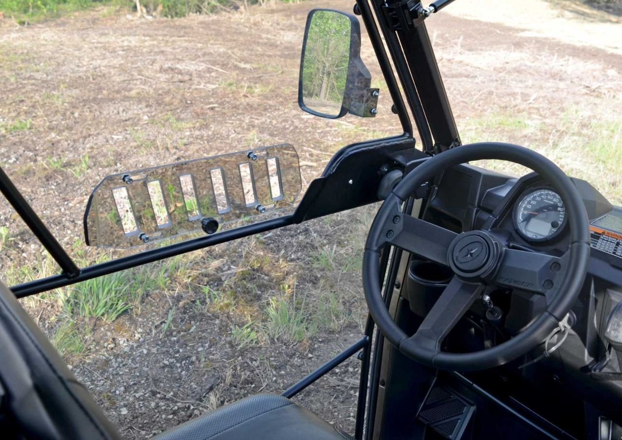 View from the driver seat of the Polaris Ranger Crew showing the SuperATV vented door window and mirror
