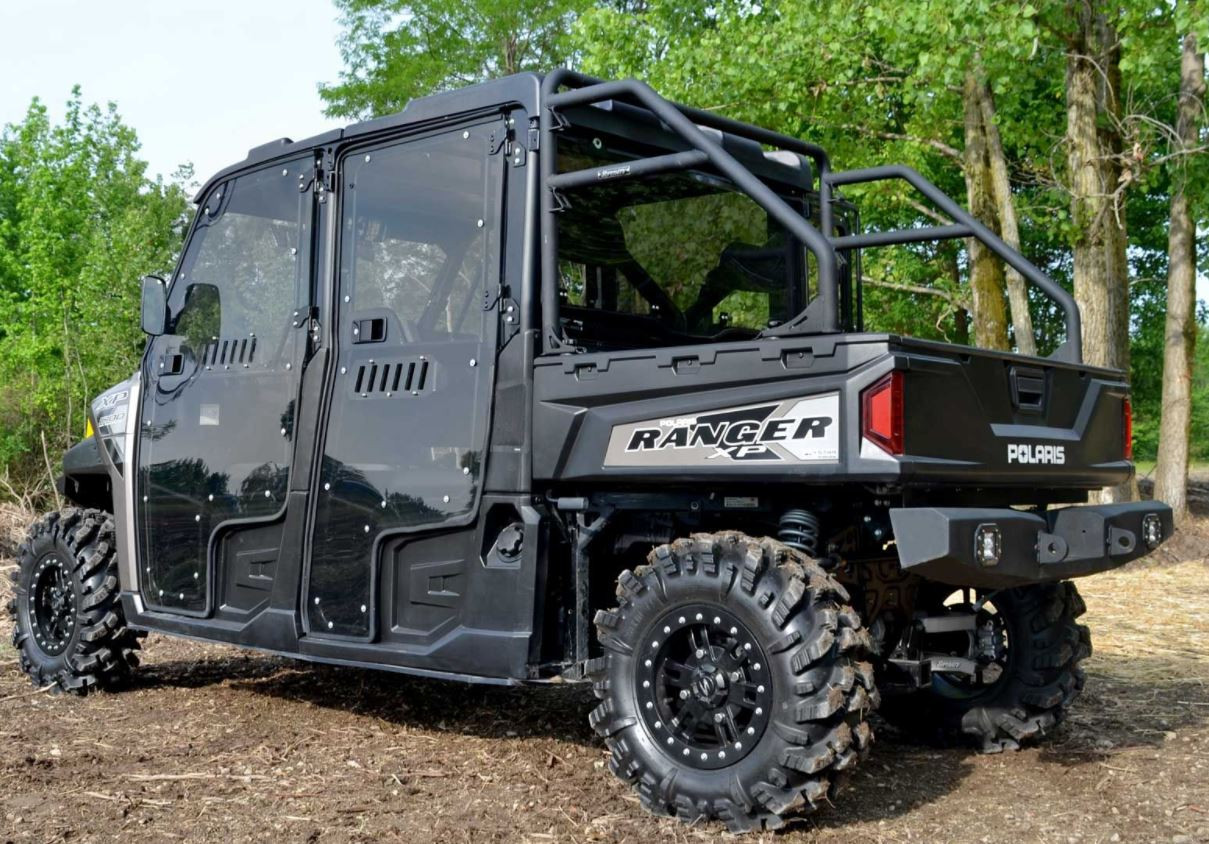 Polaris Ranger Crew with SuperATV full vented doors installed on all four positions, rear three-quarter view on mud tires