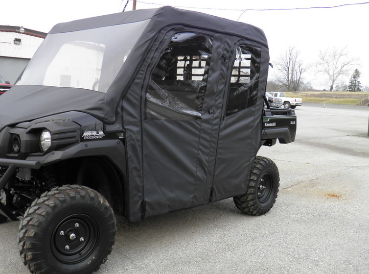 Front three-quarter view of a Kawasaki Mule ProFXT with the 3 Star vinyl windshield and doors zipped closed
