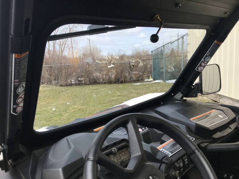 View from inside the Can-Am Maverick Trail cab through the Extreme Metal Products glass windshield with wiper