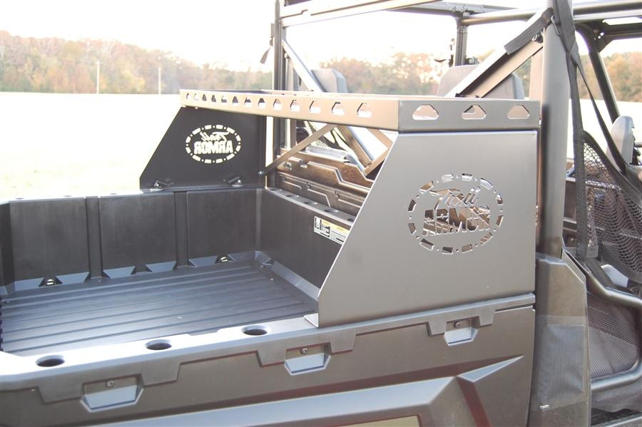 Trail Armor small rear storage rack mounted at the front of a Polaris side-by-side bed with logo cutout side plates