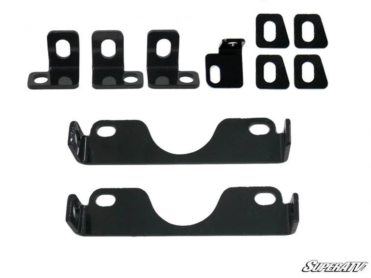 SuperATV Polaris Ranger frame stiffener brackets and spacer plates laid out on white
