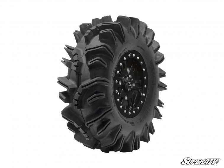 SuperATV Terminator mud tire on a black beadlock wheel, side view showing deep V-shaped tread lugs