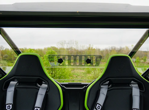 View from the Honda Talon seats through the Spike Powersports rear windshield with the vent panel between them