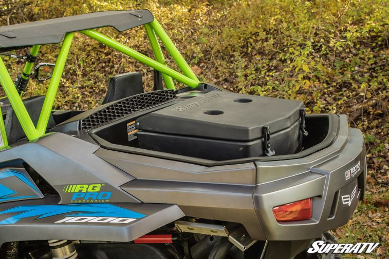 Rear three-quarter view of the SuperATV cargo box sitting in the Wildcat XX bed with the lid closed