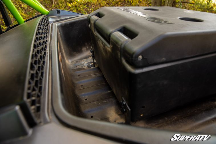 Close-up of the SuperATV cargo box lid and latch from the side of the Wildcat XX bed