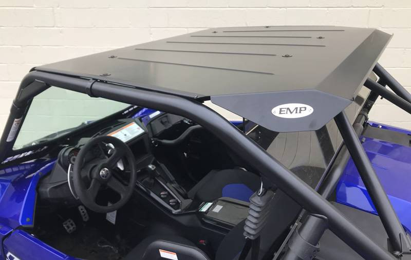 Side view of the Extreme Metal Products aluminum top on the Yamaha YXZ showing the round badge and open cab
