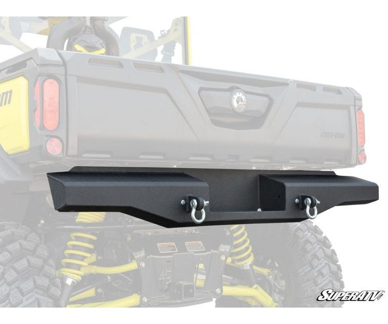 SuperATV sheet metal rear bumper with D-ring shackles on a Can-Am Defender, rear studio view with machine faded