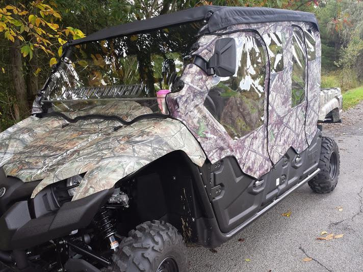 Camouflage Side X Side full cab enclosure on a matching camo Yamaha Viking VI, front three-quarter view