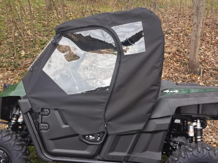 Side X Side full cab enclosure with clear vinyl door window on a green Yamaha Wolverine, driver side view
