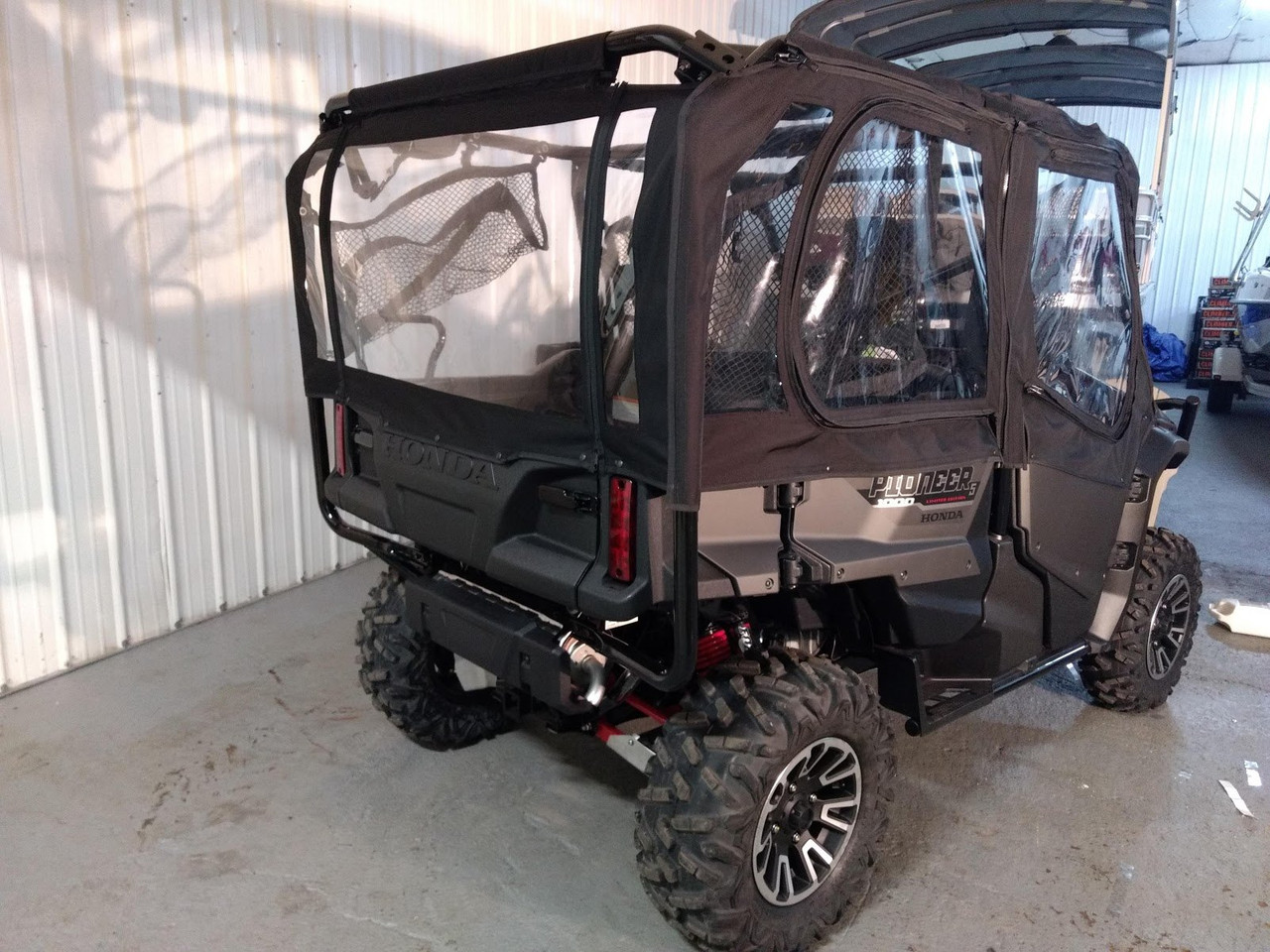 Side X Side upper doors kit on a grey Honda Pioneer 1000-5, rear three-quarter view with rear window panel