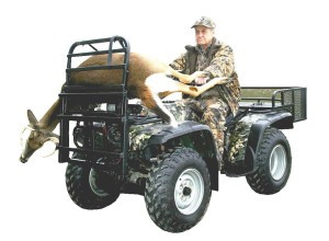 Hunter on a camouflage ATV with a deer raised on the Great Day Power Loader front lift