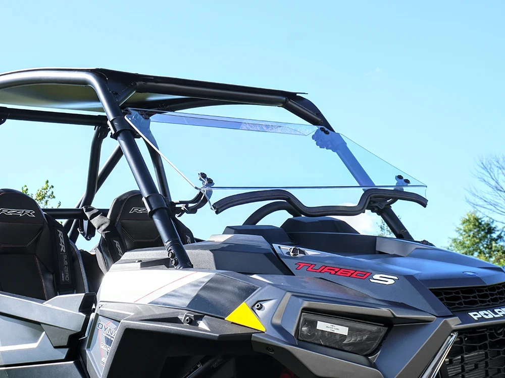 Direction 2 tilting windshield for Polaris RZR Turbo S and Turbo S 4: windshield in tilted position on a gray Polaris RZR...