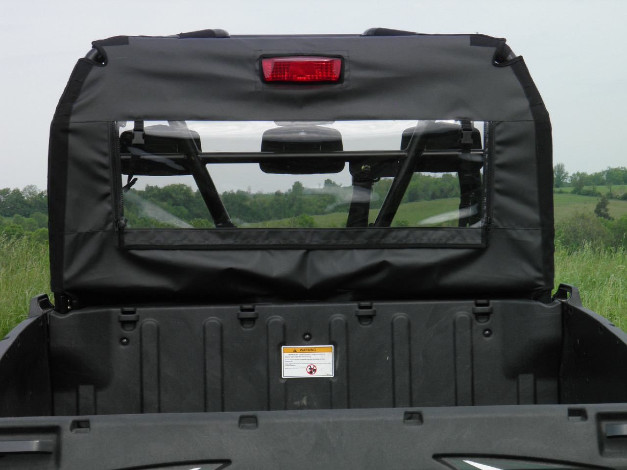 3 Star soft rear window with clear vinyl panel and brake light cutout above the bed of an Arctic Cat Prowler 550