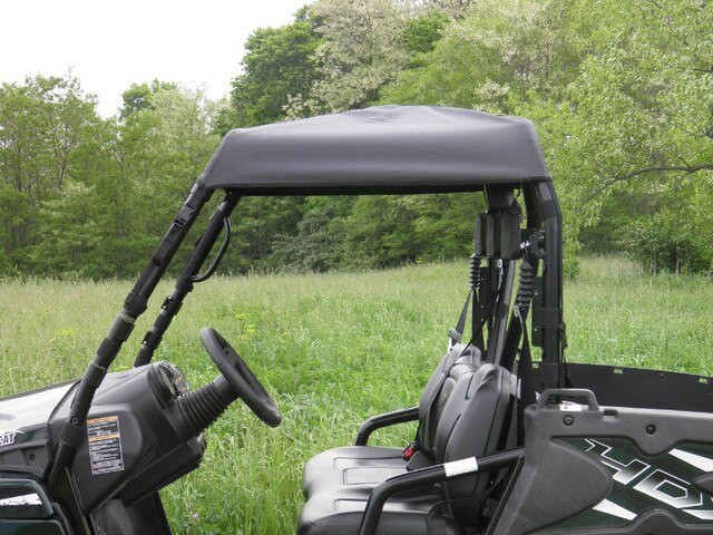 3 Star black soft top mounted on the roll cage of an Arctic Cat Prowler, close view from the driver side
