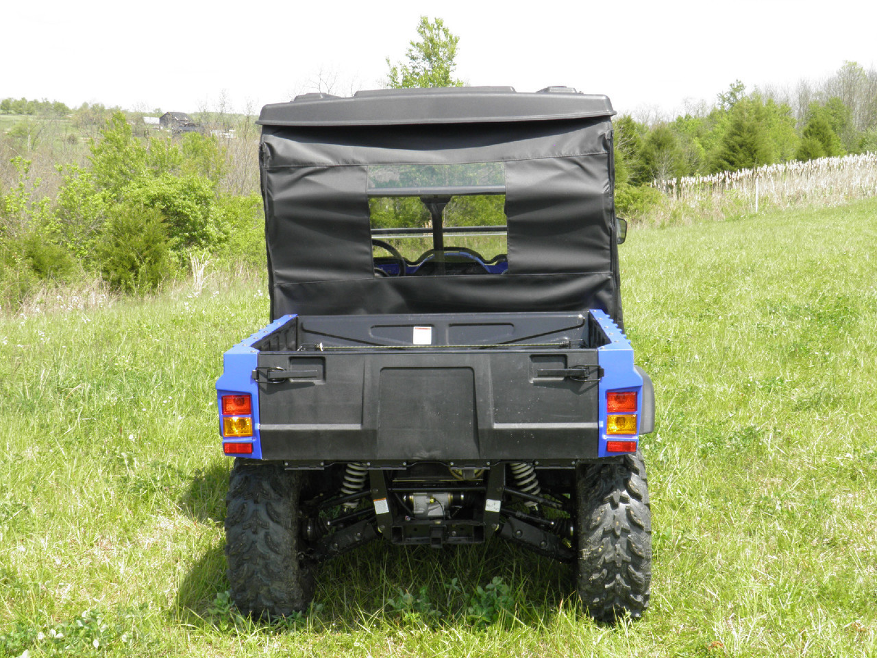 Rear view of the Hisun HS800 with the 3 Star tinted soft rear window and top over the cargo bed