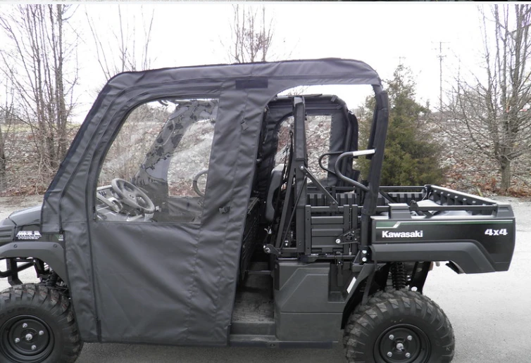 Side view of the Kawasaki Mule Pro-FXT with the 3 Star soft doors on both rows and the cargo bed behind