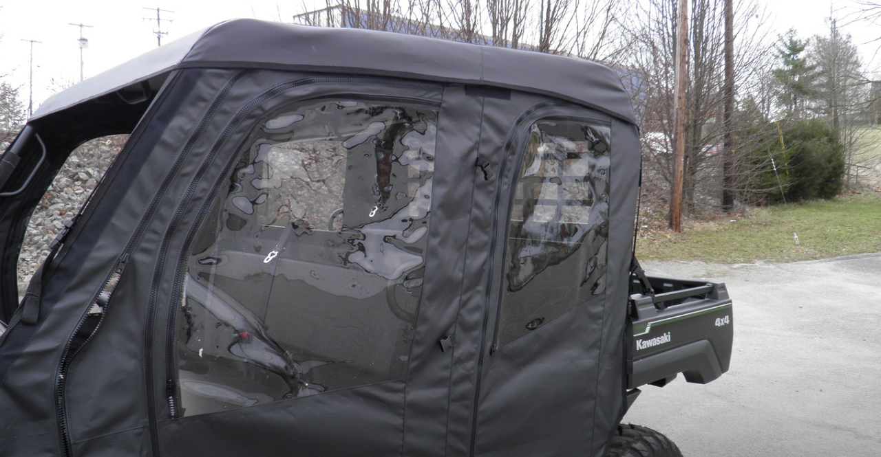 Close view of the 3 Star soft doors with clear windows and zippers on the black Kawasaki Mule Pro-FXT/DXT