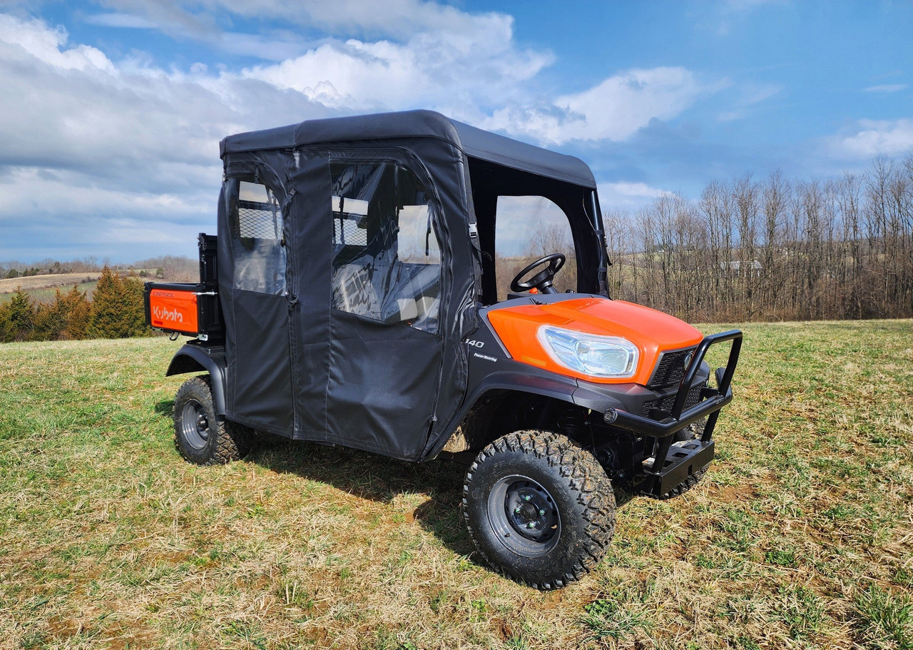 3 Star full cab enclosure on an orange Kubota RTV X1140, black cab with clear windows, front 3/4 view on grass