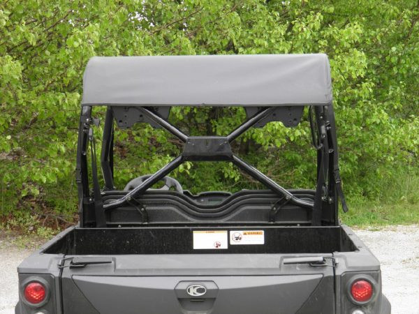Straight rear view over the tailgate of the Kymco 450 showing the 3 Star soft top from behind
