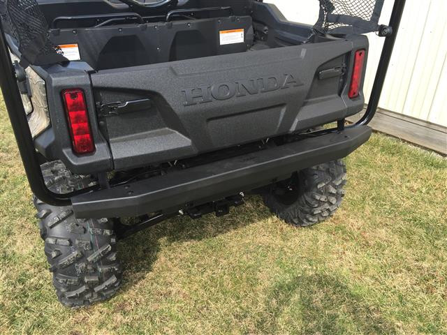 Extreme Metal Products black tube rear bumper installed below the tailgate of a camo Honda Pioneer 1000-5, rear view