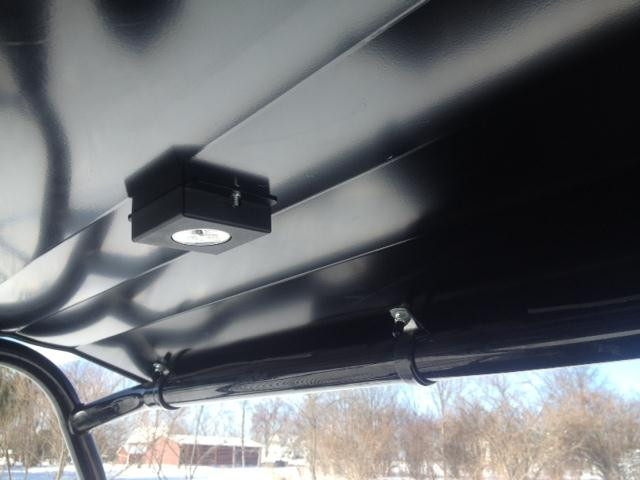 Underside of the Extreme Metal Products aluminum top on the Honda Pioneer 700 showing the mounted dome light