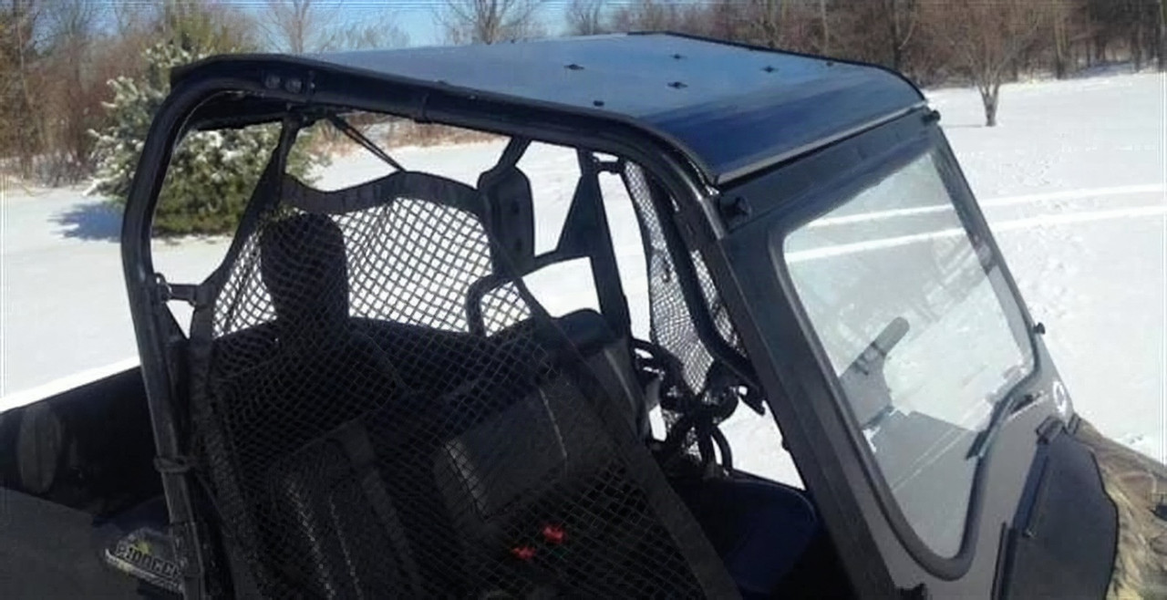 Extreme Metal Products black aluminum top installed on a Honda Pioneer 700 in snow, rear three-quarter view of the roof